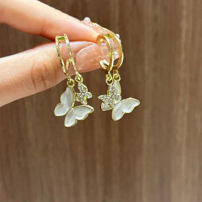 Boucles d'oreilles clous exquises papillon fleur mignonne pour femme