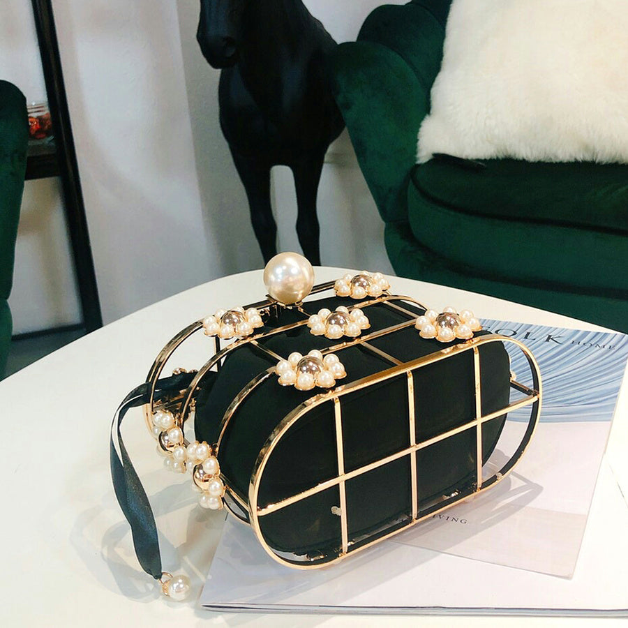 Spring new style European and American style female fashion female bag solid color bucket bag metal flower
