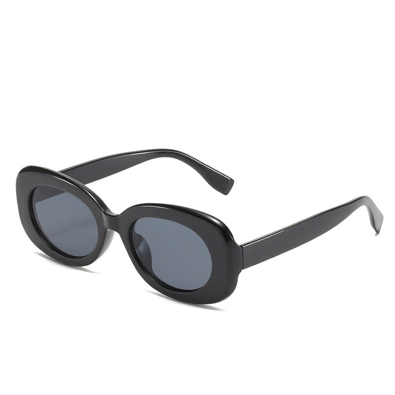 Lunettes de soleil simples à monture ovale et colorée