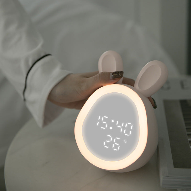 Electronic small alarm clock students use charging