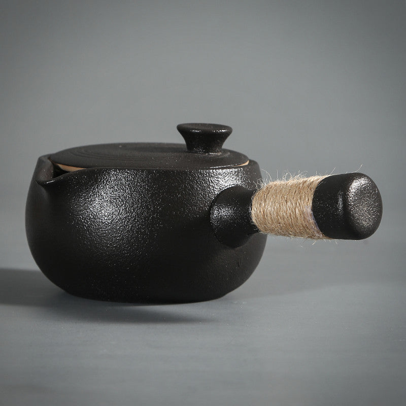 Chauffe-thé en poterie noire de style japonais et service à thé Kung Fu