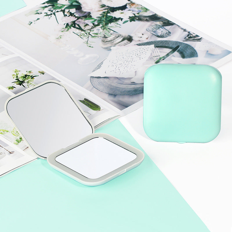 Miroir de maquillage pliant Amazon Source avec lumière LED créative Miroir portable Mini miroir de sac