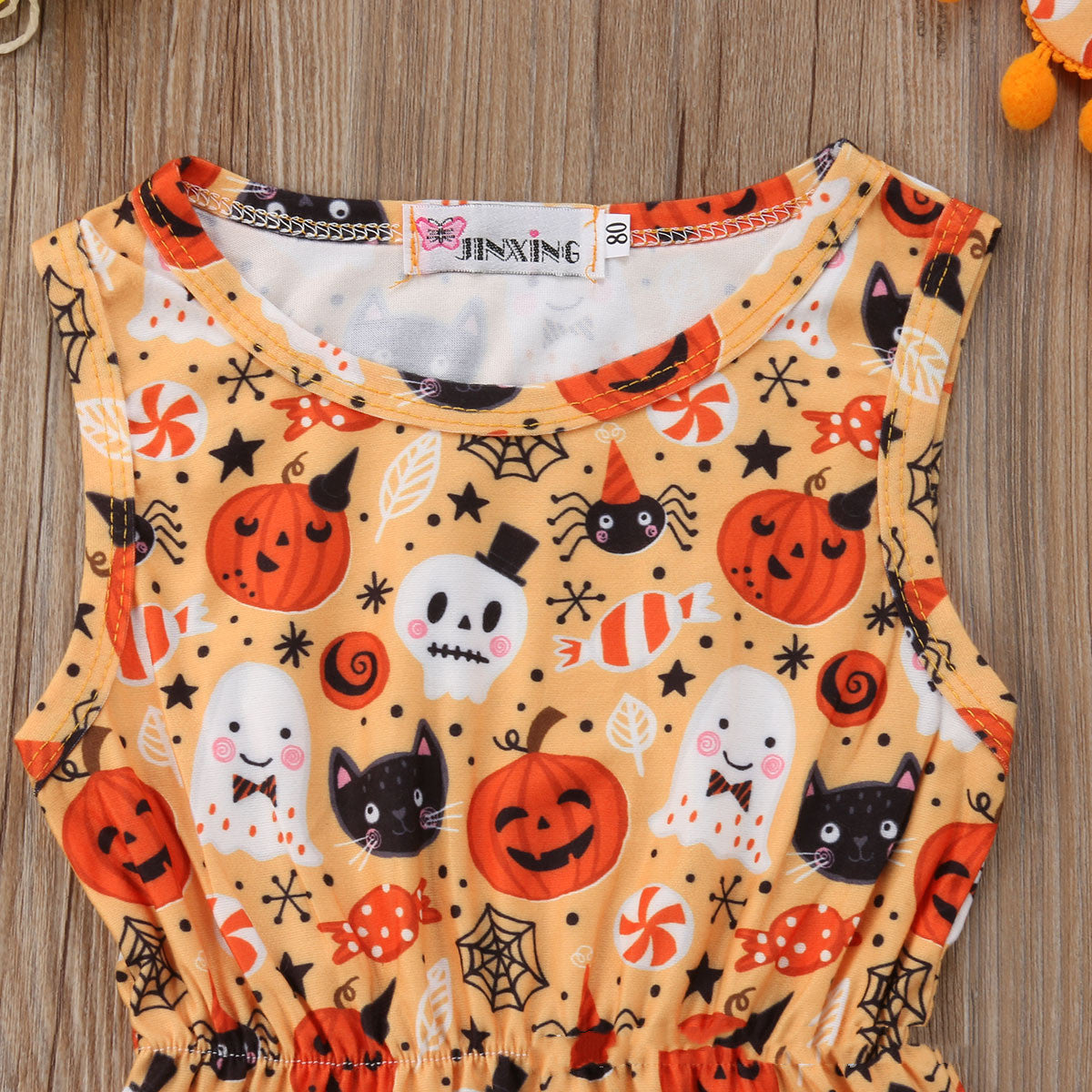 Furry ball triangle romper