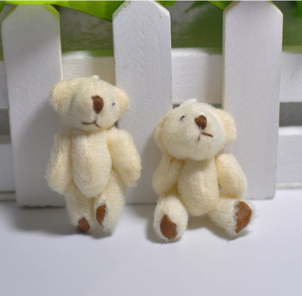1 mini-peluche en forme d'ourson