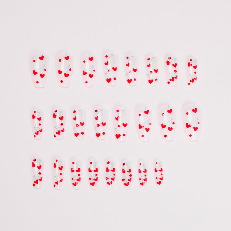 Cerises rouges en forme de cœur, petit modèle français à porter.