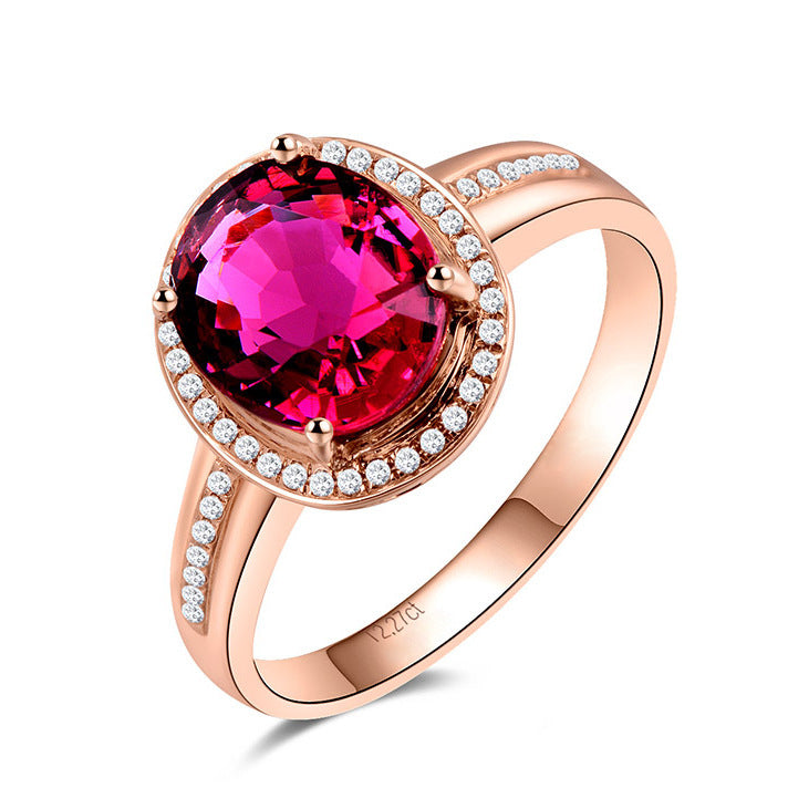 Bagues en or serties de diamants, de rubis et de cristaux rouges