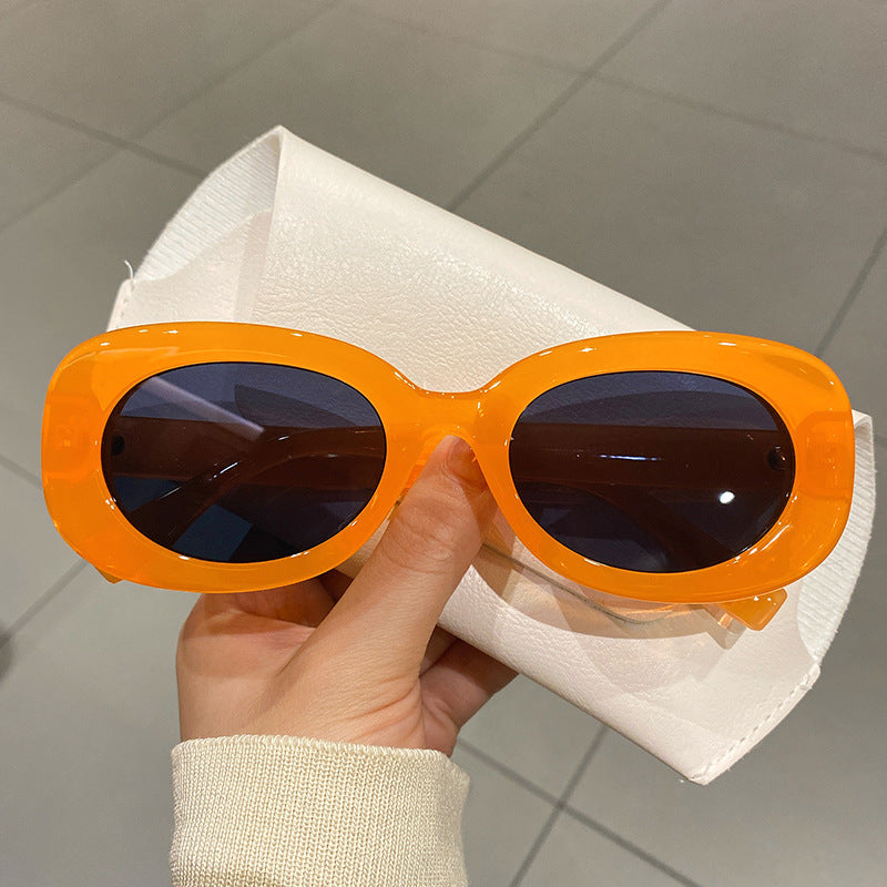 Lunettes de soleil simples à monture ovale et colorée