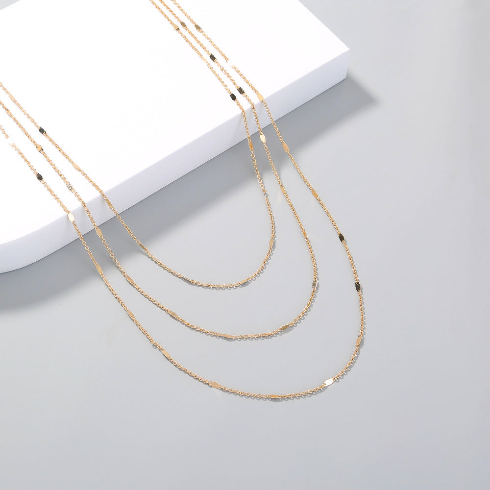 Creative, multi-layered necklace lady