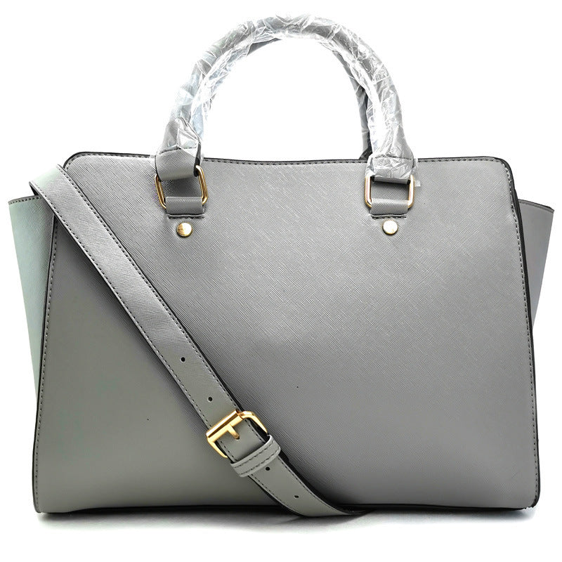 Smiley cross pattern shoulder bag