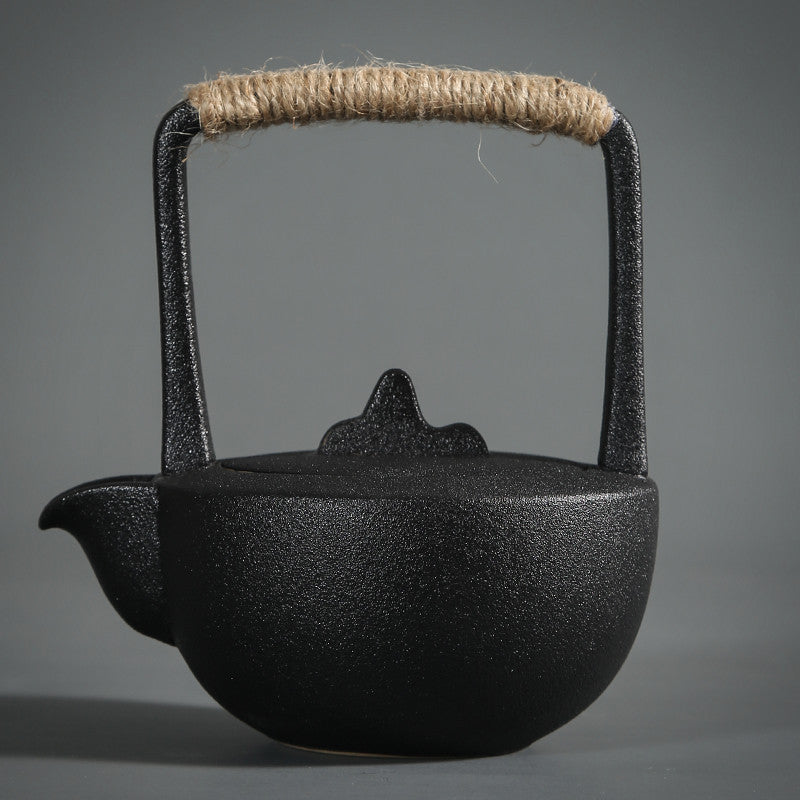 Chauffe-thé en poterie noire de style japonais et service à thé Kung Fu