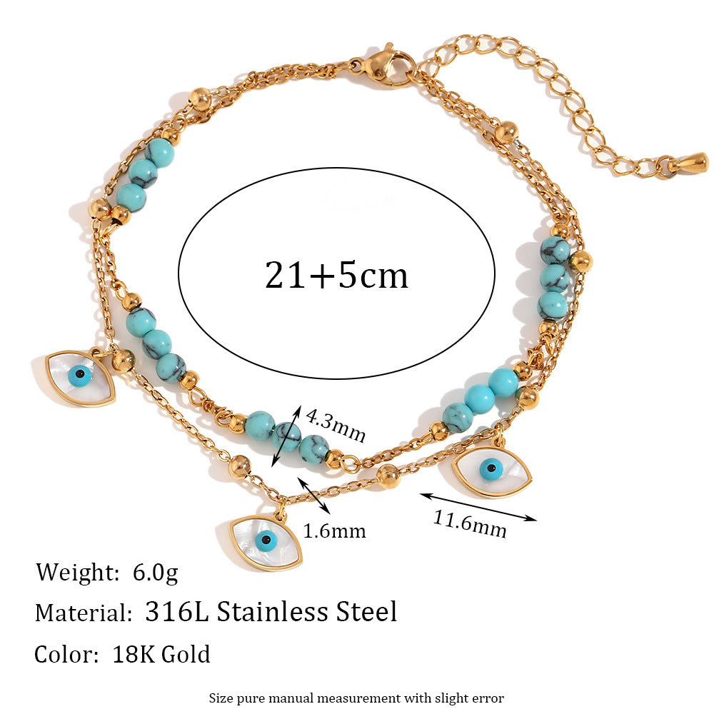 Chaîne de cheville double cercle turquoise et coquillage blanc