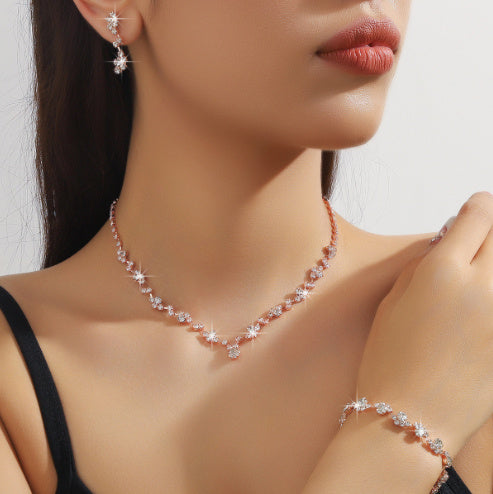 Ensemble collier, boucles d'oreilles et bracelet trois pièces pour femme
