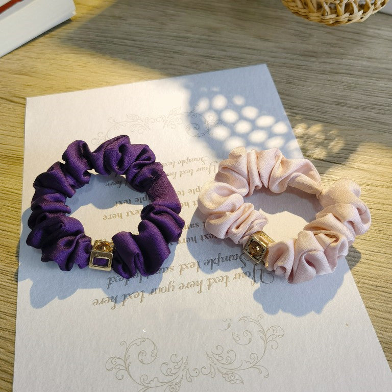 Accessoires capillaires de mode Coiffe assortie Couleur unie Diamant Bague à cheveux simple et élégante