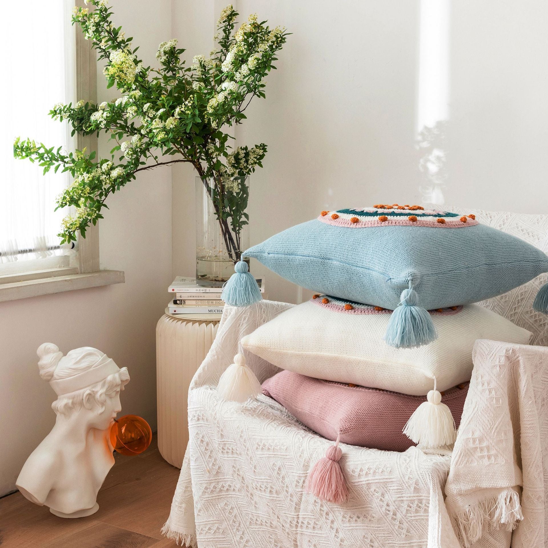 Housse de coussin tricotée à pompons pour canapé