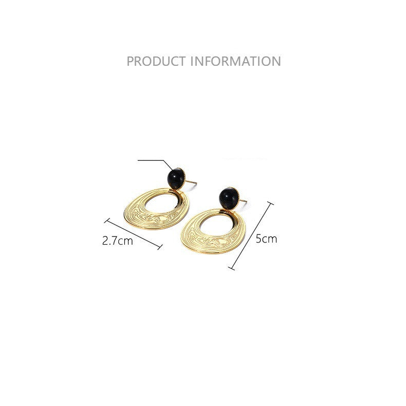 Boucles d'oreilles créoles en acier titane plaqué or 18 carats, texture concave-convexe