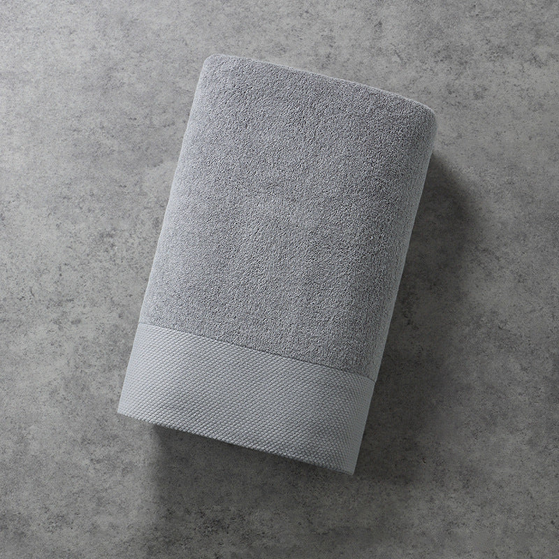 Serviette de bain en coton épaissi, au style affirmé