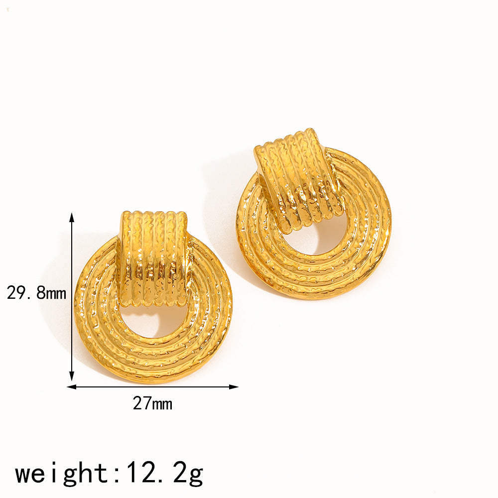 Boucles d'oreilles Boussole Marteau en Titane et Acier Exagérées
