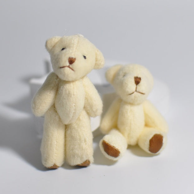 1 mini-peluche en forme d'ourson
