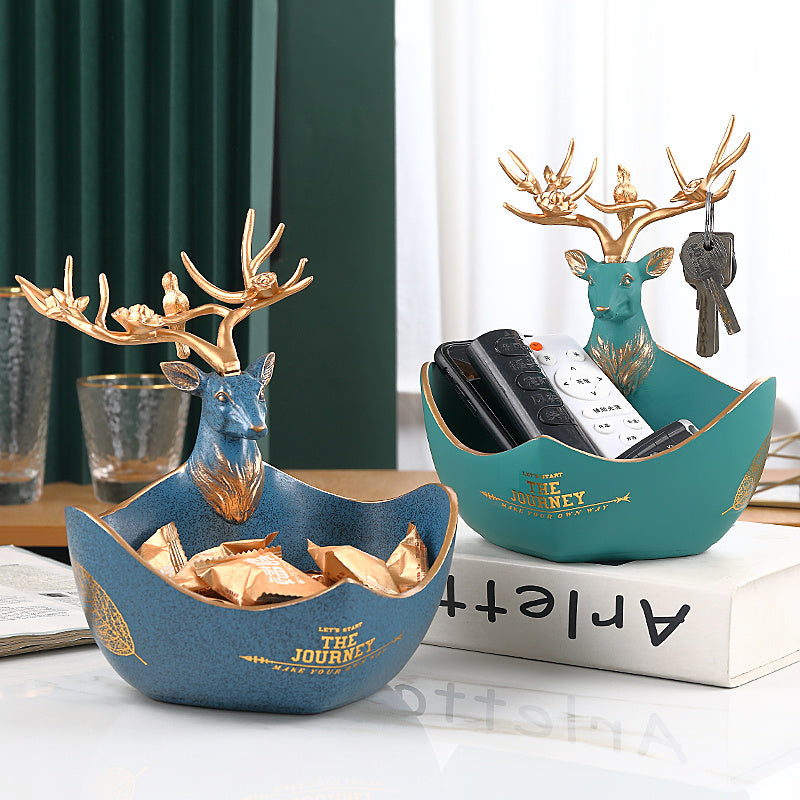 The cute little deer receives the decorations