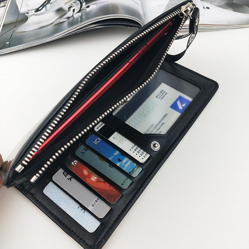Portefeuille pour femme en cuir verni, tenu à la main