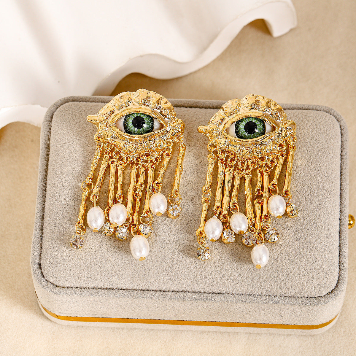 Boucles d'oreilles rétro françaises exagérées pour femme, œil de diable unique