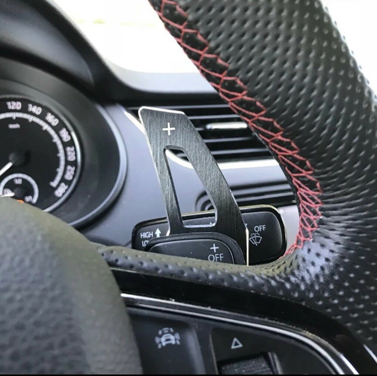 Car Steering Wheel Paddles Are Retrofitted With Interior Trim