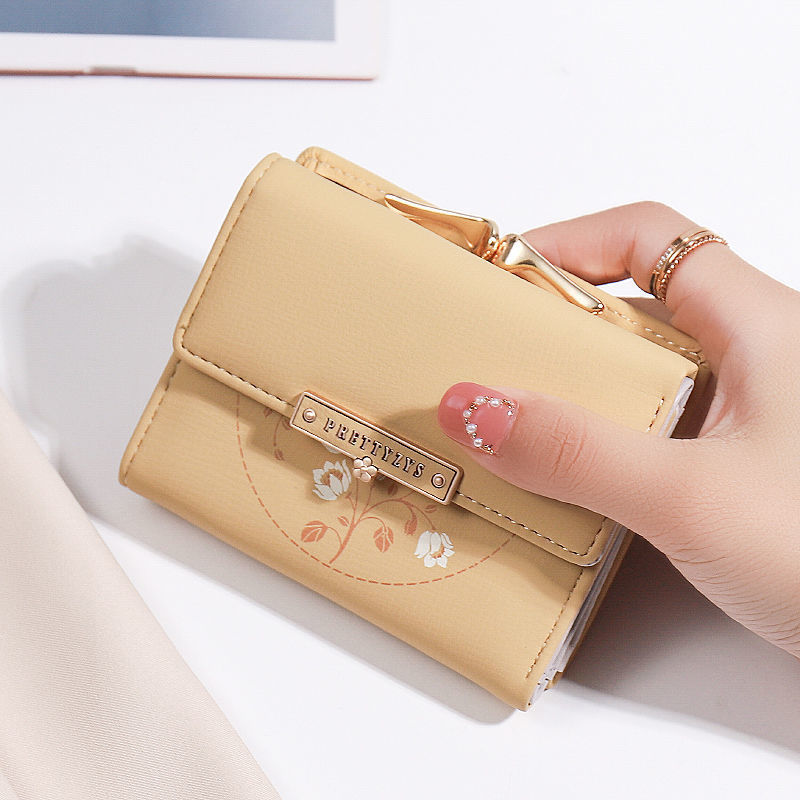 Portefeuille simple à trois volets pour femme avec porte-cartes