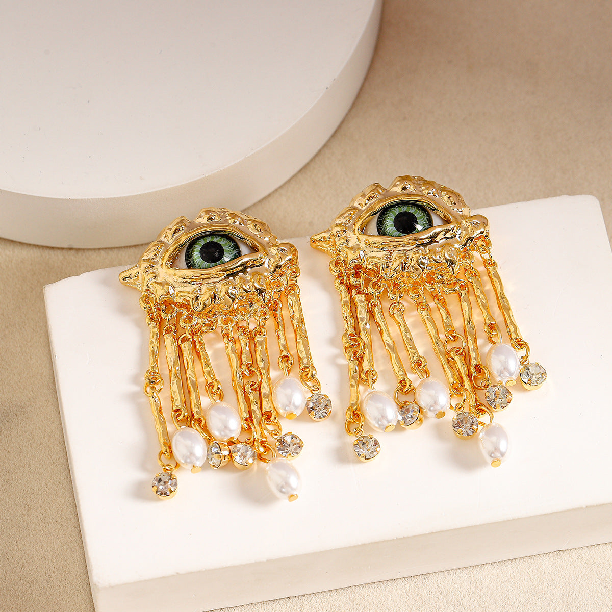 Boucles d'oreilles rétro françaises exagérées pour femme, œil de diable unique