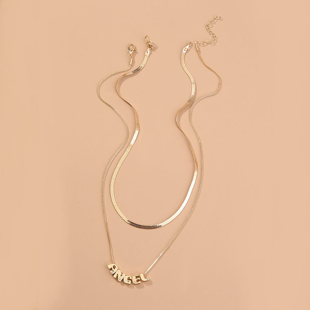 Collier en cuivre monogrammé
