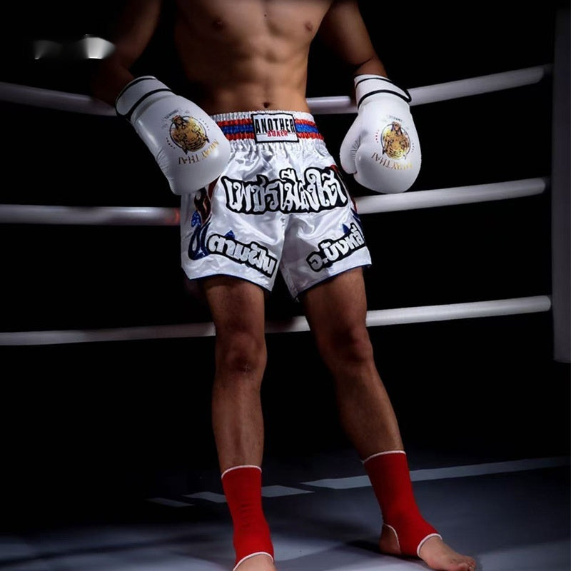Boys Muay Thai Boxing Training With A Punching Bag And Gloves