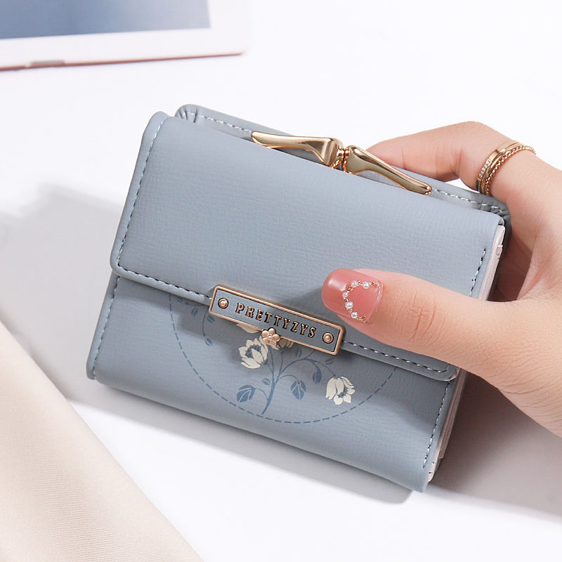 Portefeuille simple à trois volets pour femme avec porte-cartes
