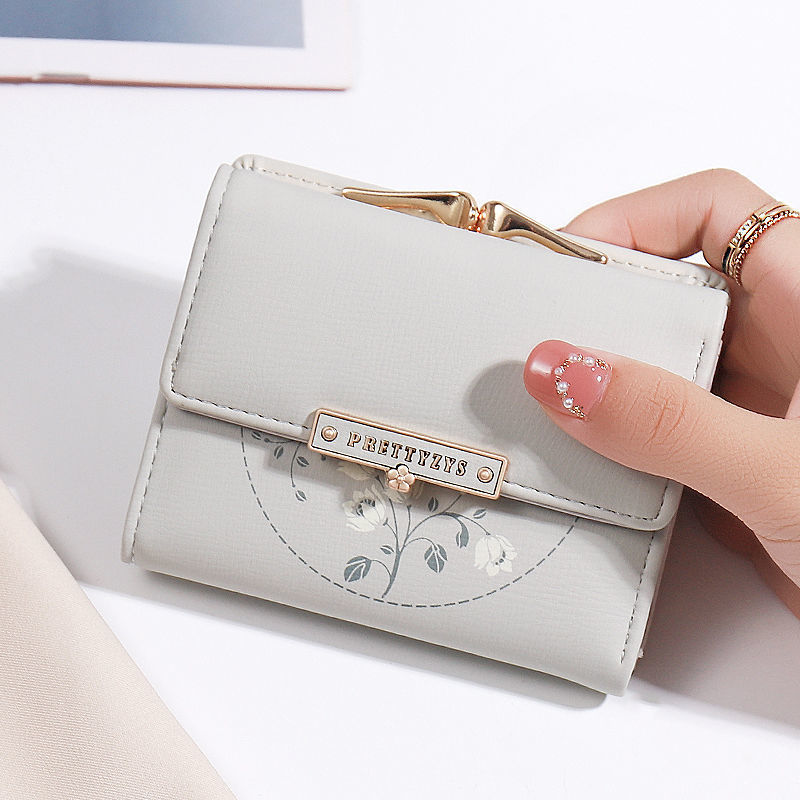 Portefeuille simple à trois volets pour femme avec porte-cartes