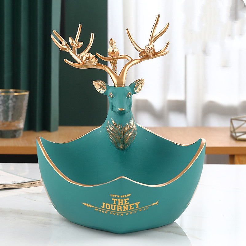 The cute little deer receives the decorations