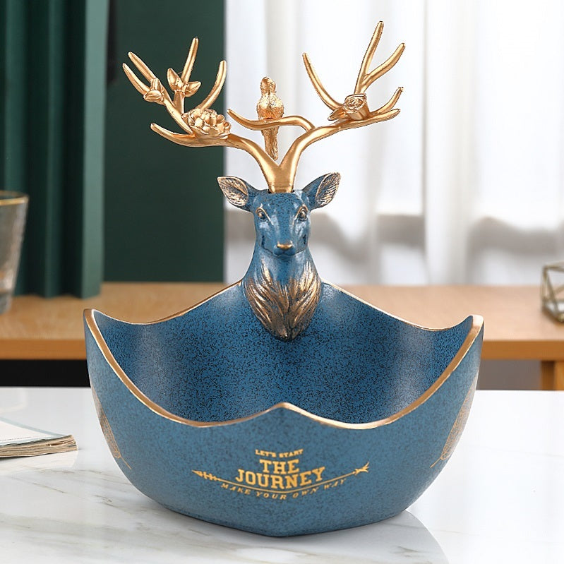 The cute little deer receives the decorations