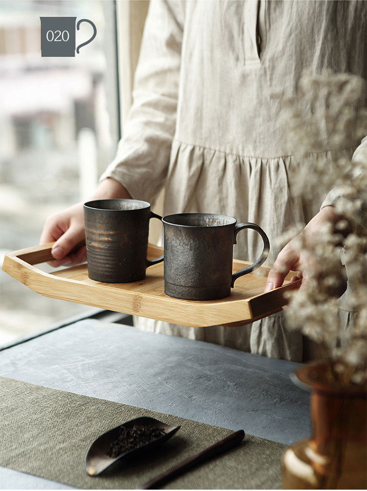 Gilt glazed ceramic tea cup