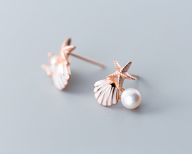 Boucles d'oreilles étoiles et coquillages