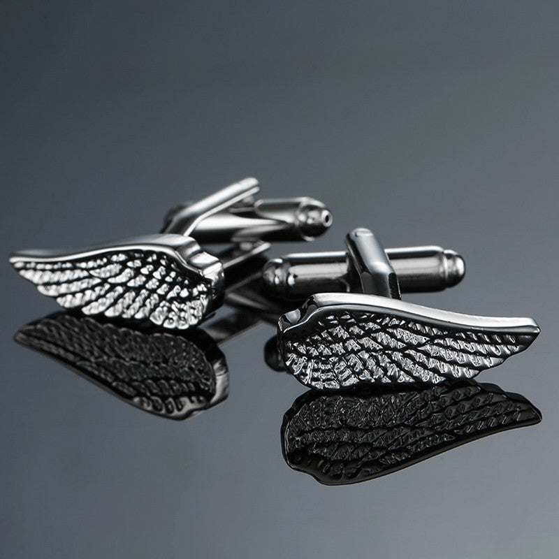 Boutons de manchette en cuivre sculpté motif Ailes d'argent