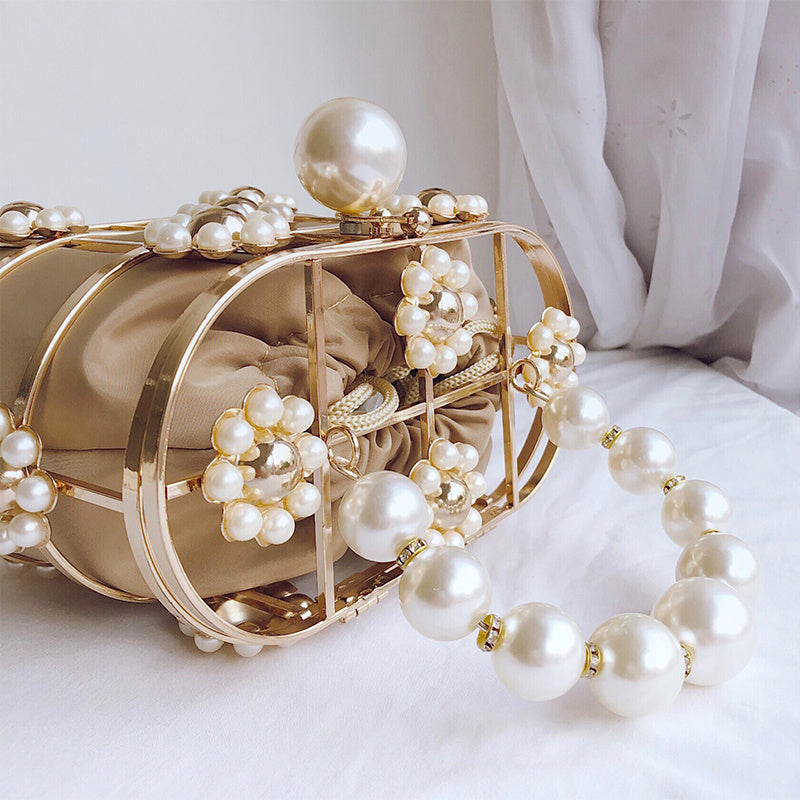 Spring new style European and American style female fashion female bag solid color bucket bag metal flower