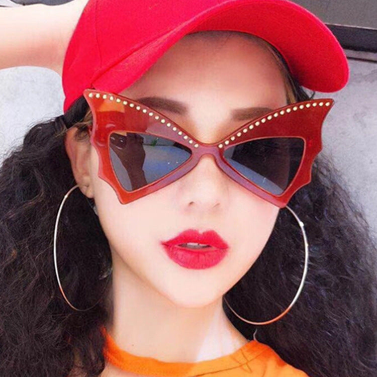 Lunettes de soleil cloutées chauve-souris