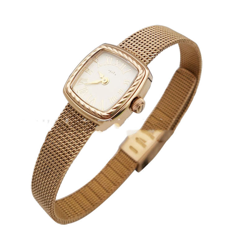 Montre carrée sculptée