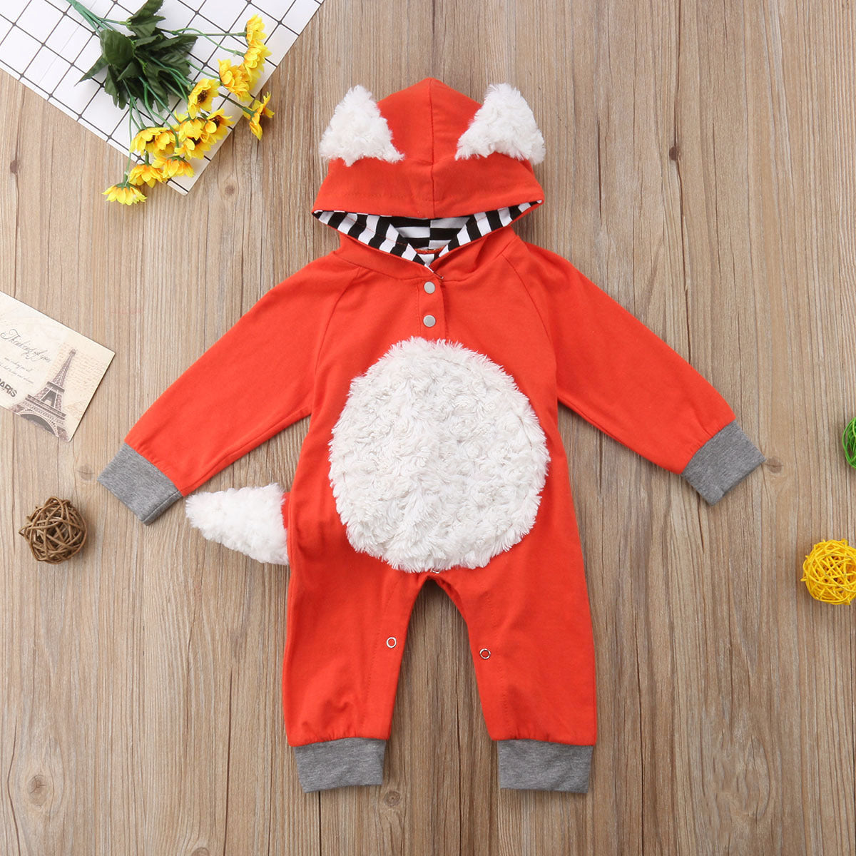Cartoon fox in a long-sleeved onesie