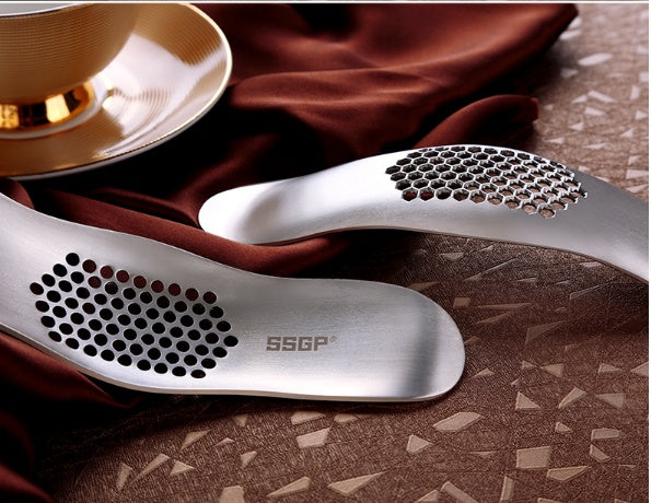 Stainless steel garlic press
