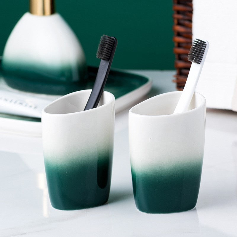 Washing suit couple brushing teeth and mouthwash cup