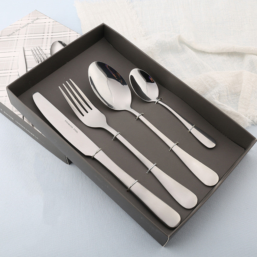 Four stainless steel cutlery