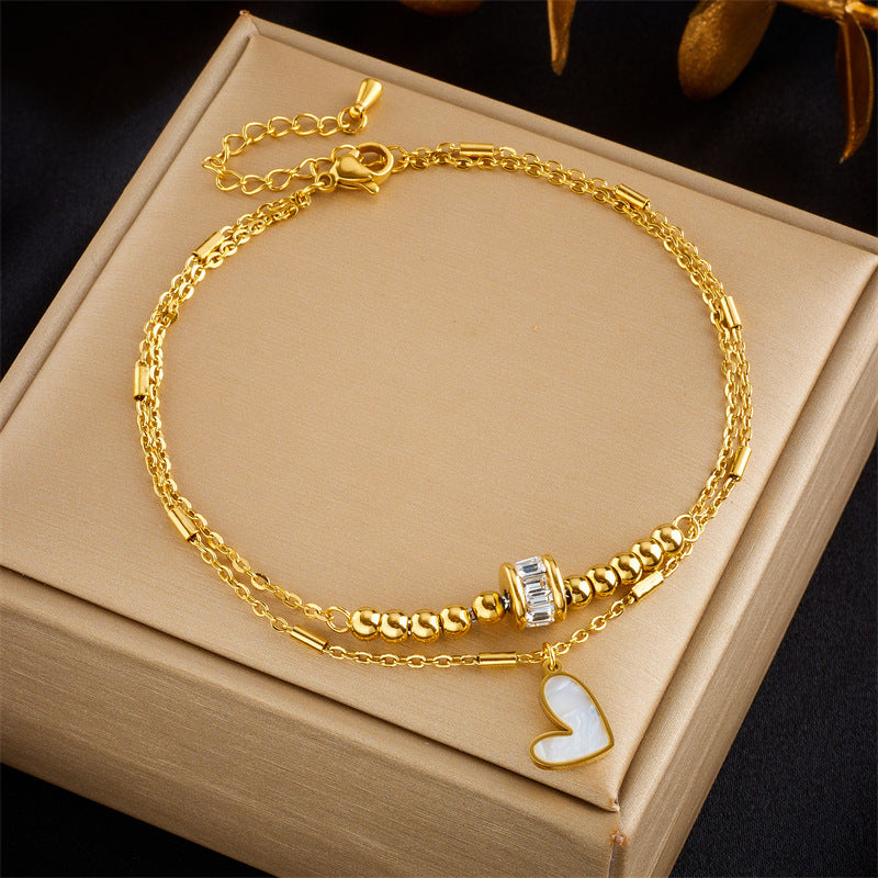 Bijoux fantaisie Boho Classique Amour Cœur Chaîne de cheville Double couche Chaîne bracelet Cheville Charme Pompon Chaîne de jambe Chaîne de pied Femme Fête Bijoux Accessoires