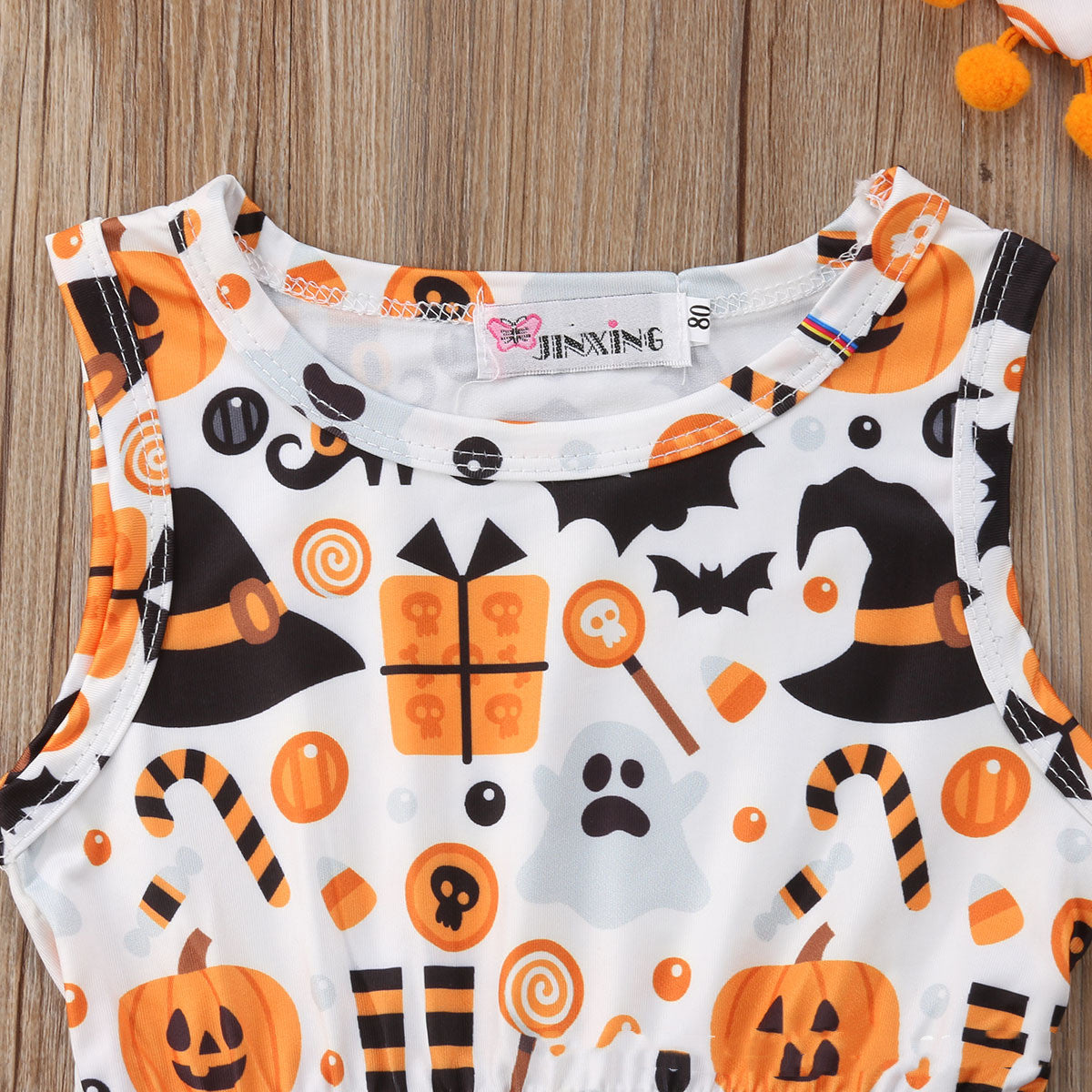 Furry ball triangle romper