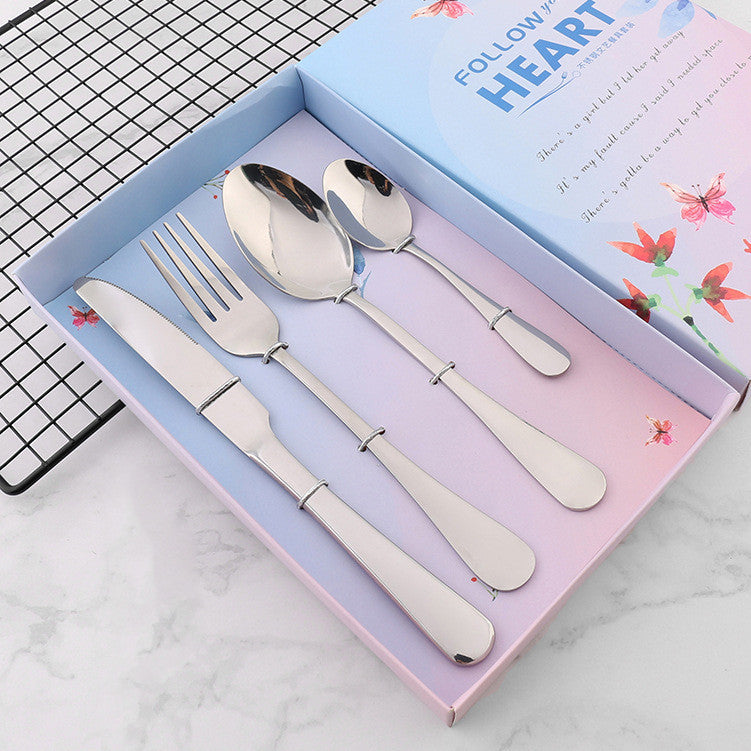 Four stainless steel cutlery