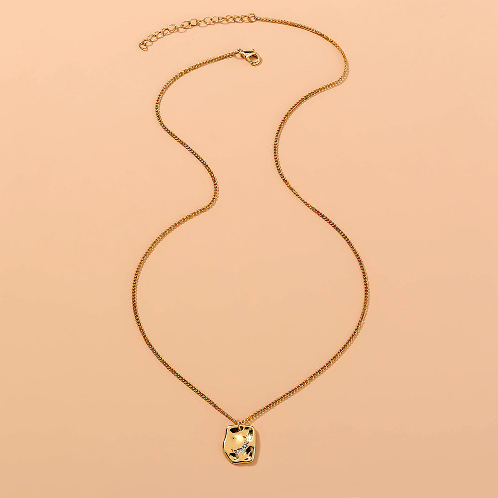 Irregular tag necklace with diamond inlay