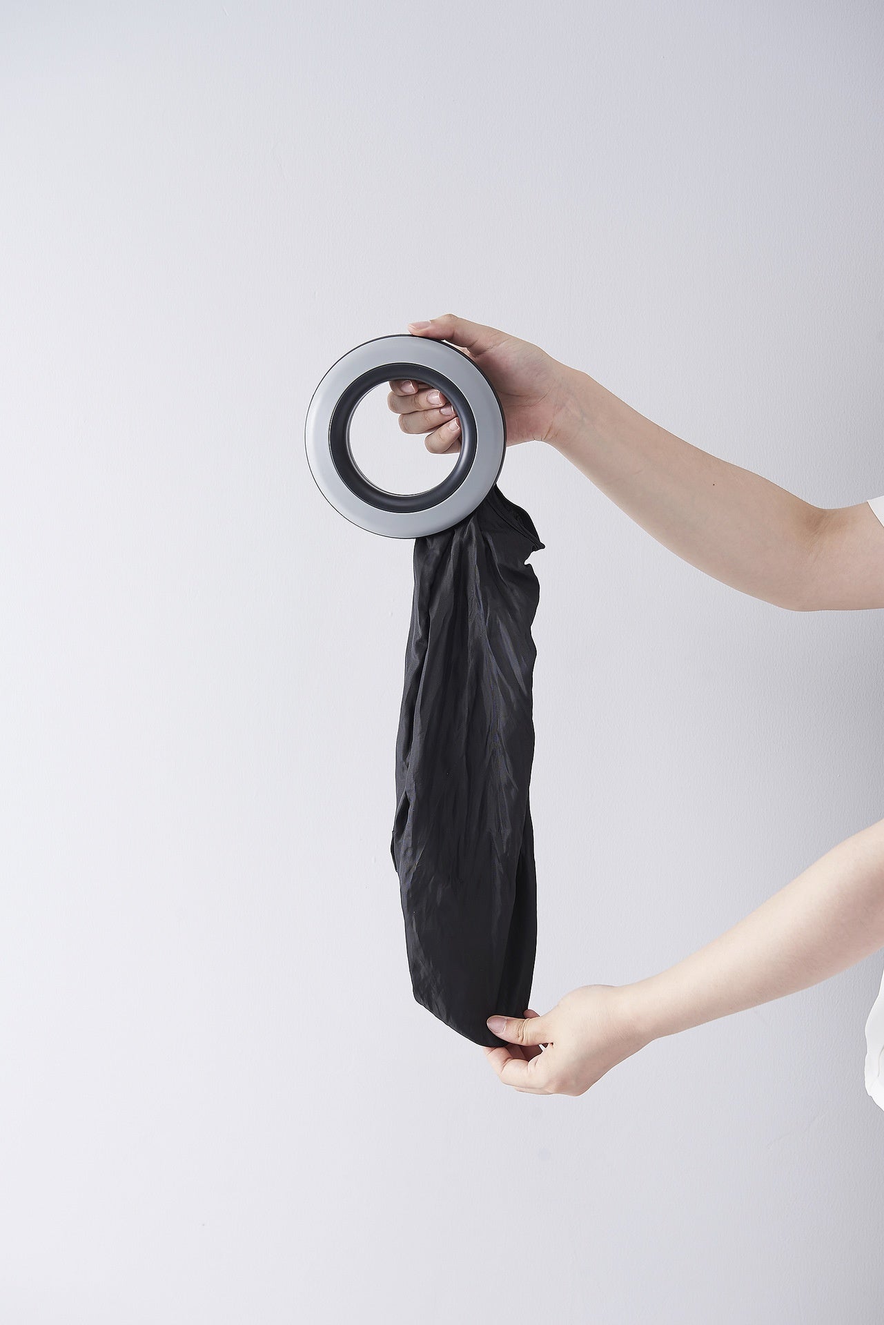 Rotating shopping bag folding storage bag