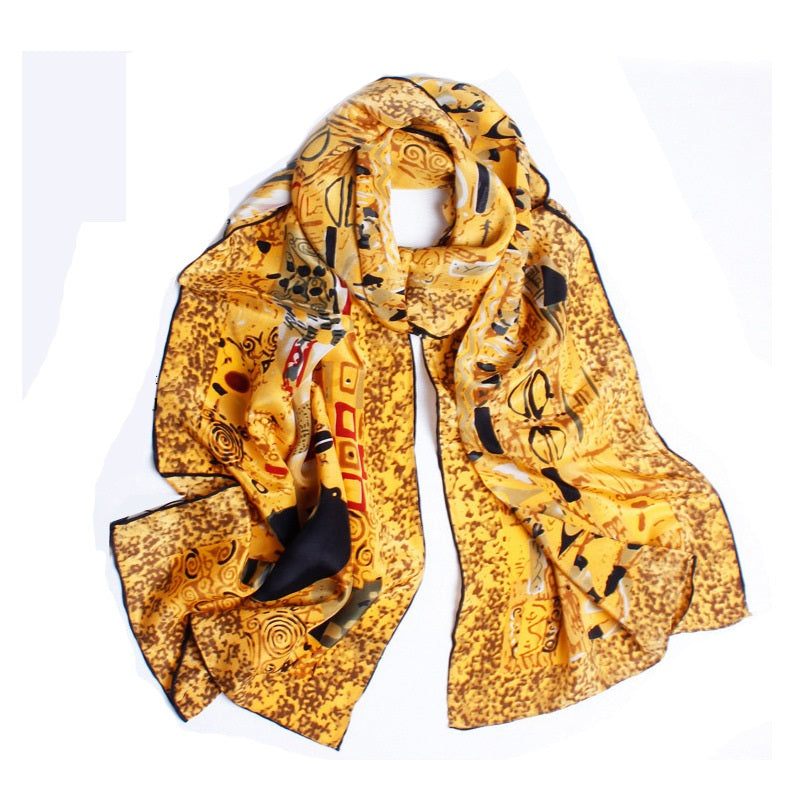 Yellow patterned scarf on a white background